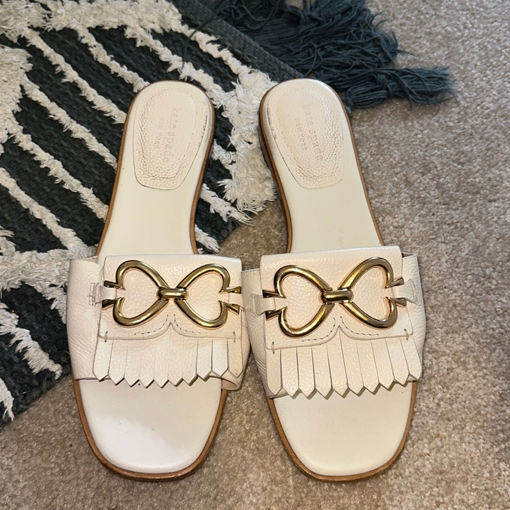 Kate Spade slides, size 8. Double gold hearts and white fringe